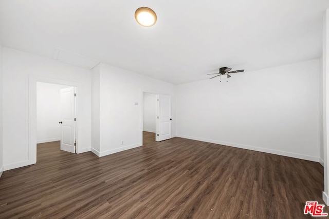 interior space with ceiling fan and dark wood-type flooring