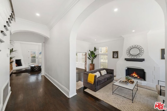 hallway with crown molding and dark hardwood / wood-style floors