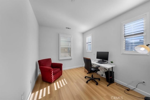 home office featuring wood-type flooring