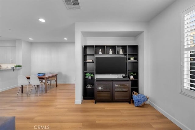 living room with light wood-type flooring