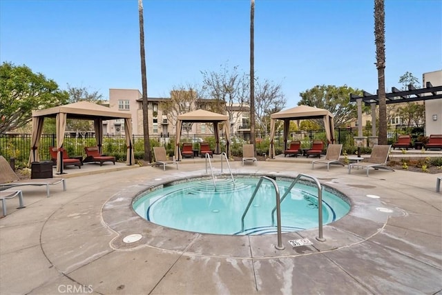 view of pool featuring a gazebo and a patio area