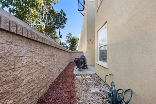 view of home's exterior featuring a patio