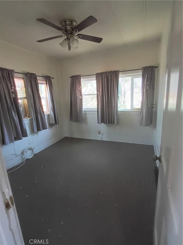 spare room with ceiling fan