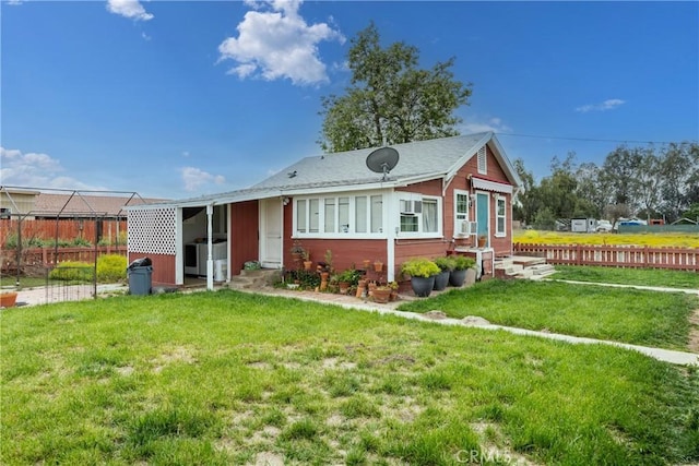 view of front of home with a front yard