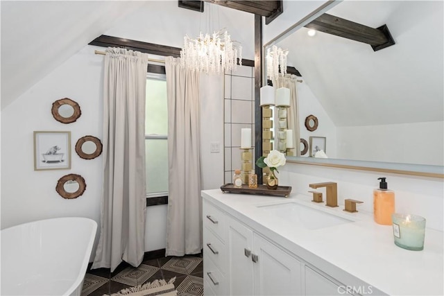 bathroom with a bath, vaulted ceiling, and vanity