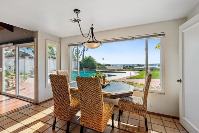 dining space featuring a healthy amount of sunlight