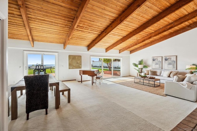 living room featuring beamed ceiling, high vaulted ceiling, light colored carpet, and wood ceiling