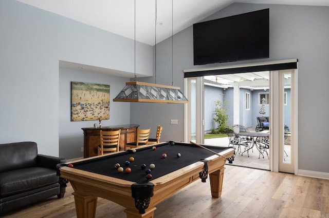 playroom featuring light hardwood / wood-style floors, high vaulted ceiling, and billiards