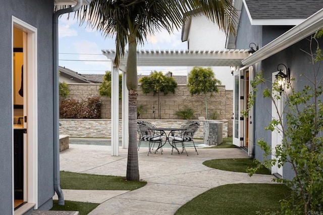 view of patio / terrace featuring a pergola