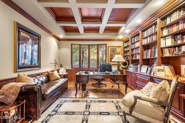 home office with crown molding, coffered ceiling, beam ceiling, built in features, and wood walls