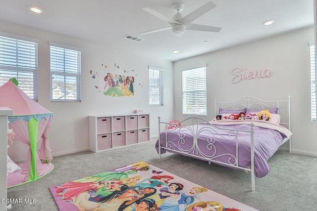 carpeted bedroom featuring ceiling fan