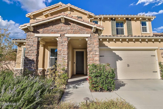 view of front of house with a garage