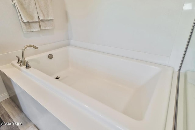 bathroom featuring hardwood / wood-style floors