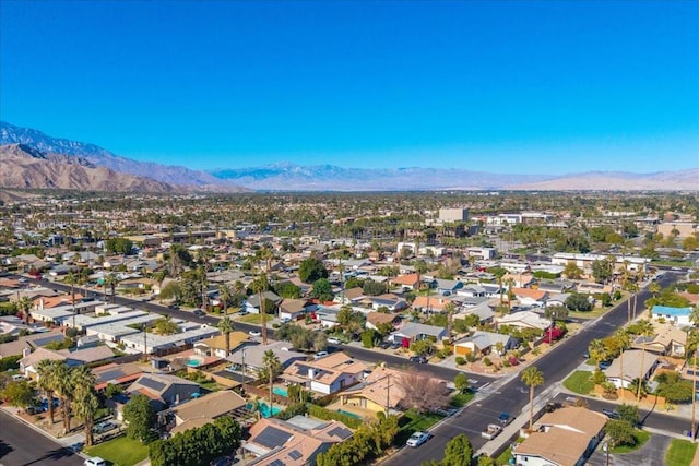 drone / aerial view featuring a mountain view