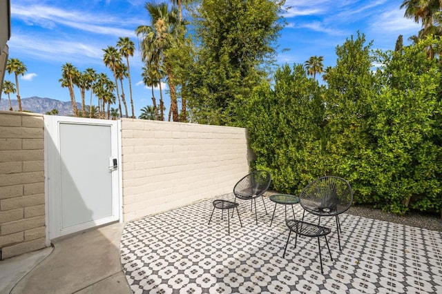 view of patio featuring a mountain view