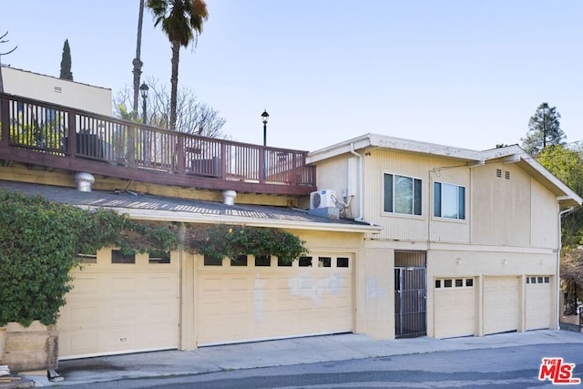 view of front of home featuring ac unit