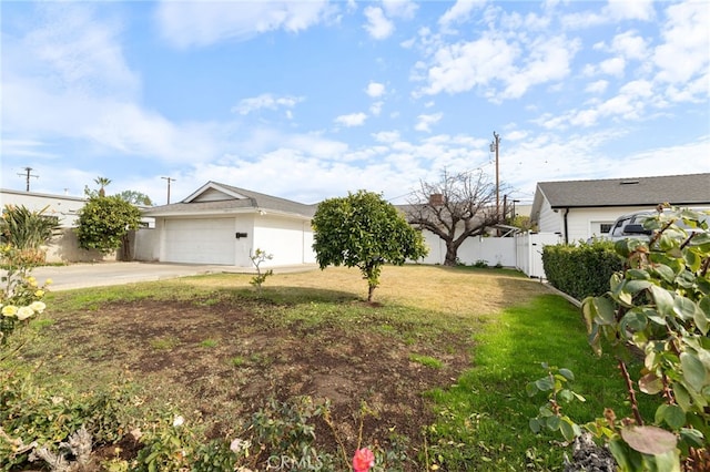 view of yard with a garage