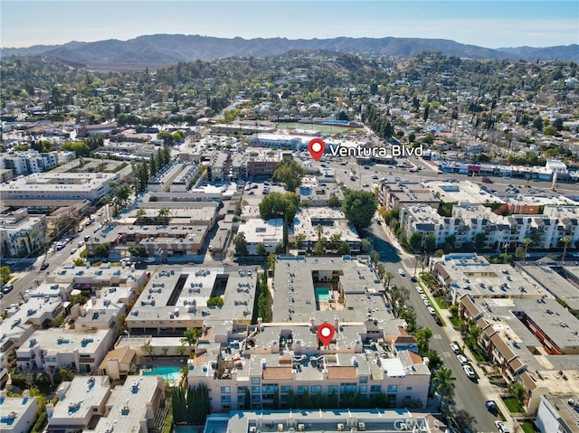 drone / aerial view featuring a mountain view