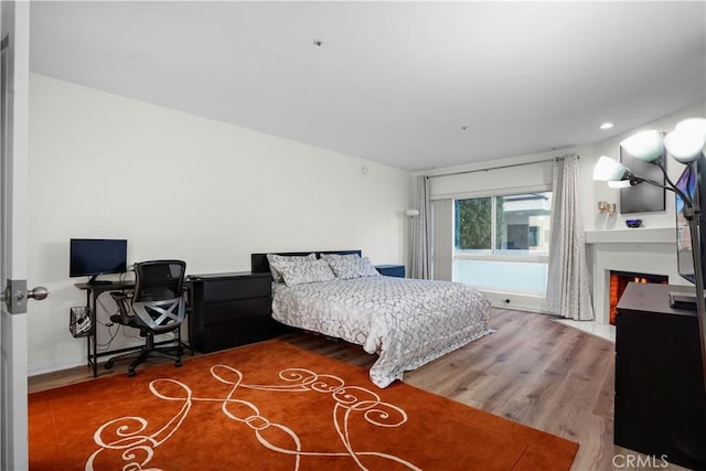 bedroom featuring hardwood / wood-style flooring