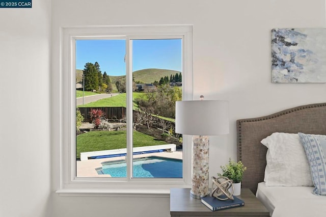 interior space featuring plenty of natural light and a mountain view