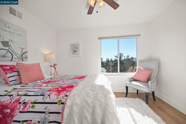 bedroom featuring ceiling fan and wood-type flooring