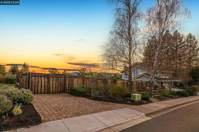 view of patio terrace at dusk