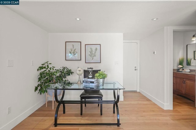 office space featuring light hardwood / wood-style floors