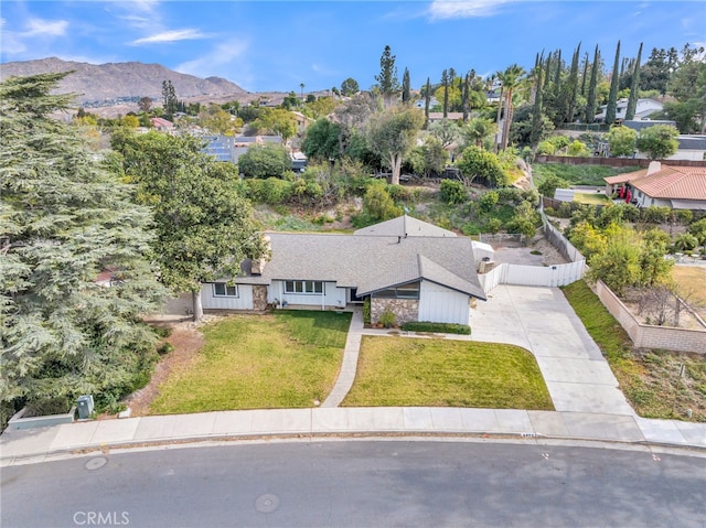 birds eye view of property featuring a mountain view