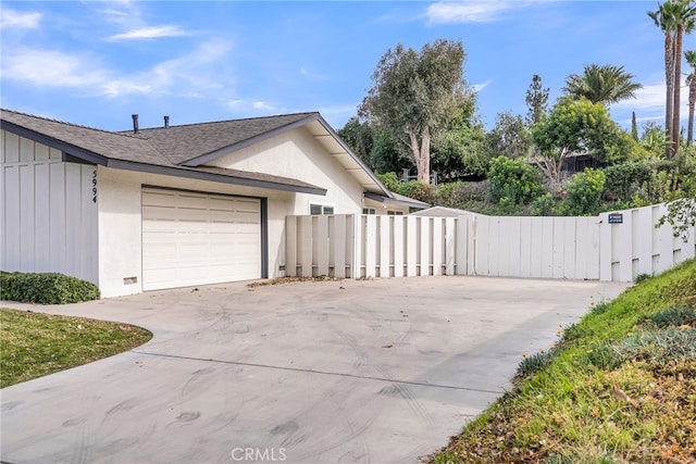 view of home's exterior featuring a garage