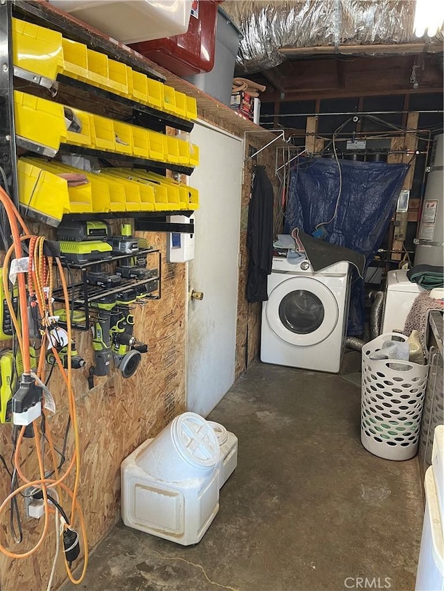 basement featuring washing machine and clothes dryer