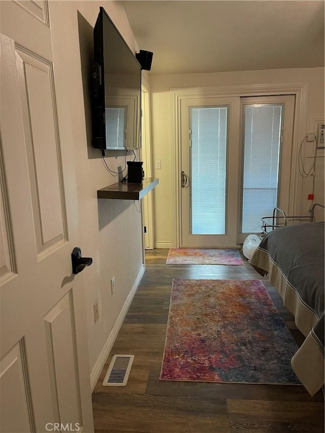 entryway featuring dark hardwood / wood-style flooring