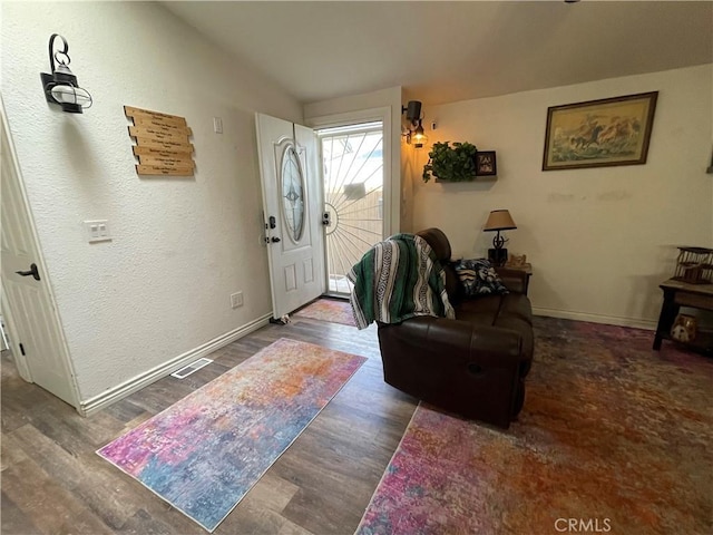 foyer featuring dark hardwood / wood-style flooring