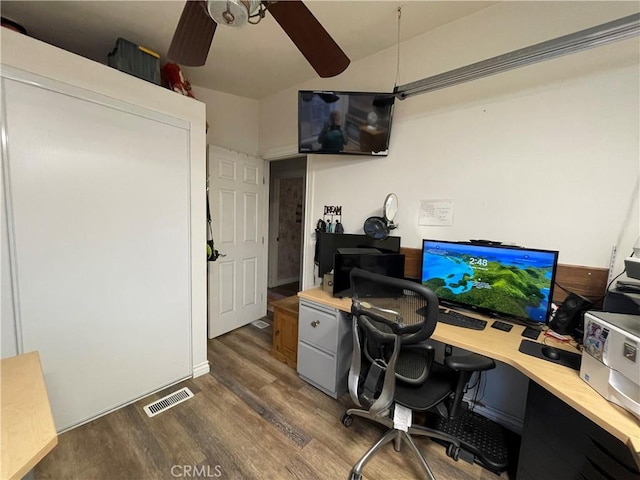 office with dark hardwood / wood-style floors and ceiling fan