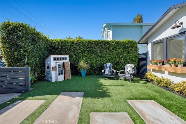 view of yard with a shed