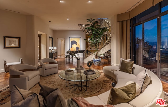 living room with parquet flooring