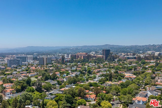 drone / aerial view featuring a mountain view