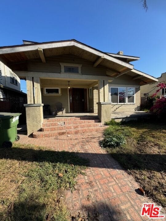 back of house with a patio area