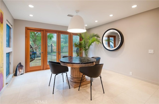 dining area featuring french doors