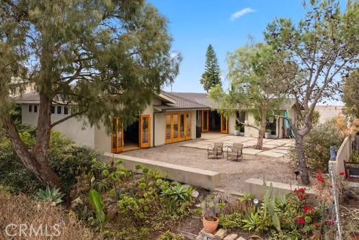 back of house featuring a patio area