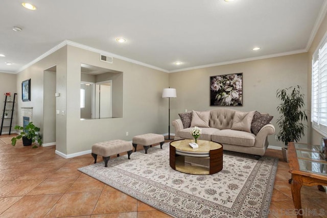 living room featuring crown molding and light tile patterned flooring