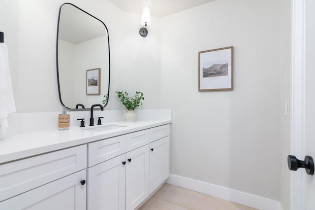 bathroom featuring vanity and tile patterned flooring