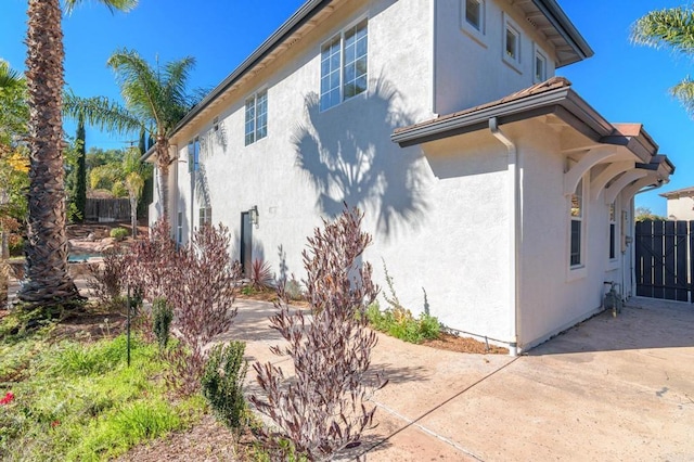 view of home's exterior with a patio area