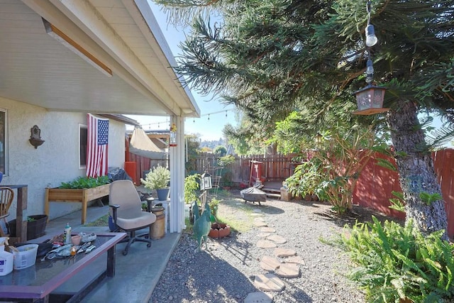 view of patio featuring a fire pit