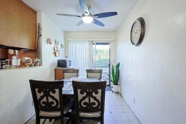 dining room with ceiling fan