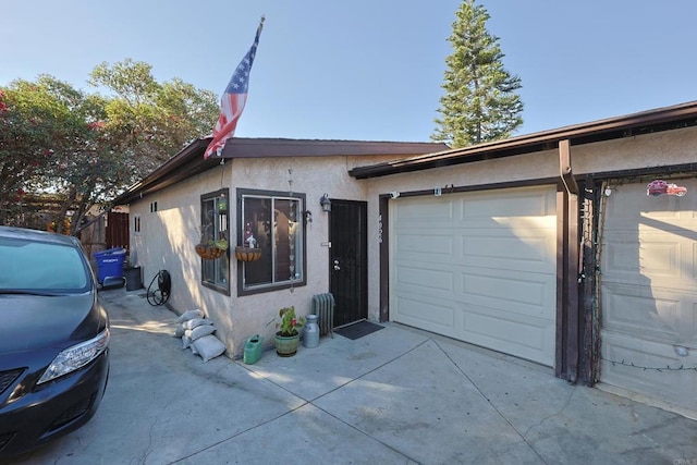 ranch-style house featuring a garage