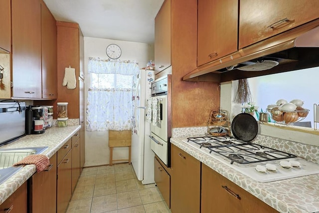 kitchen featuring white appliances