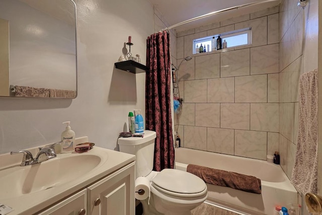 full bathroom with toilet, vanity, and shower / tub combo