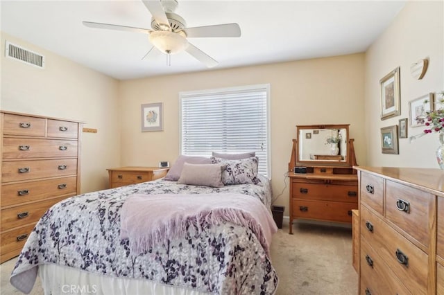 bedroom featuring ceiling fan and light colored carpet