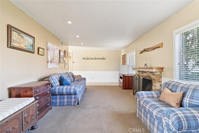 living room featuring light carpet