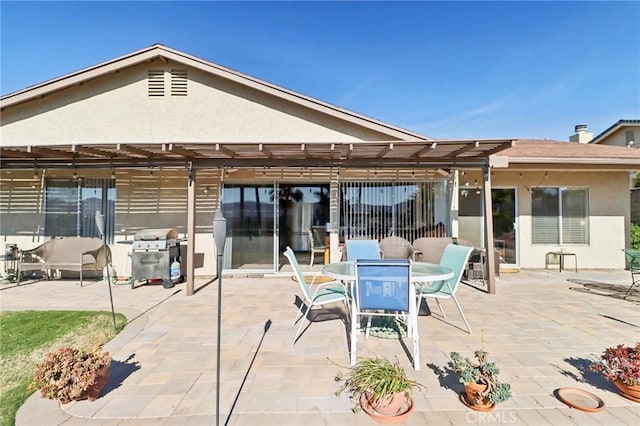 rear view of house featuring a patio area